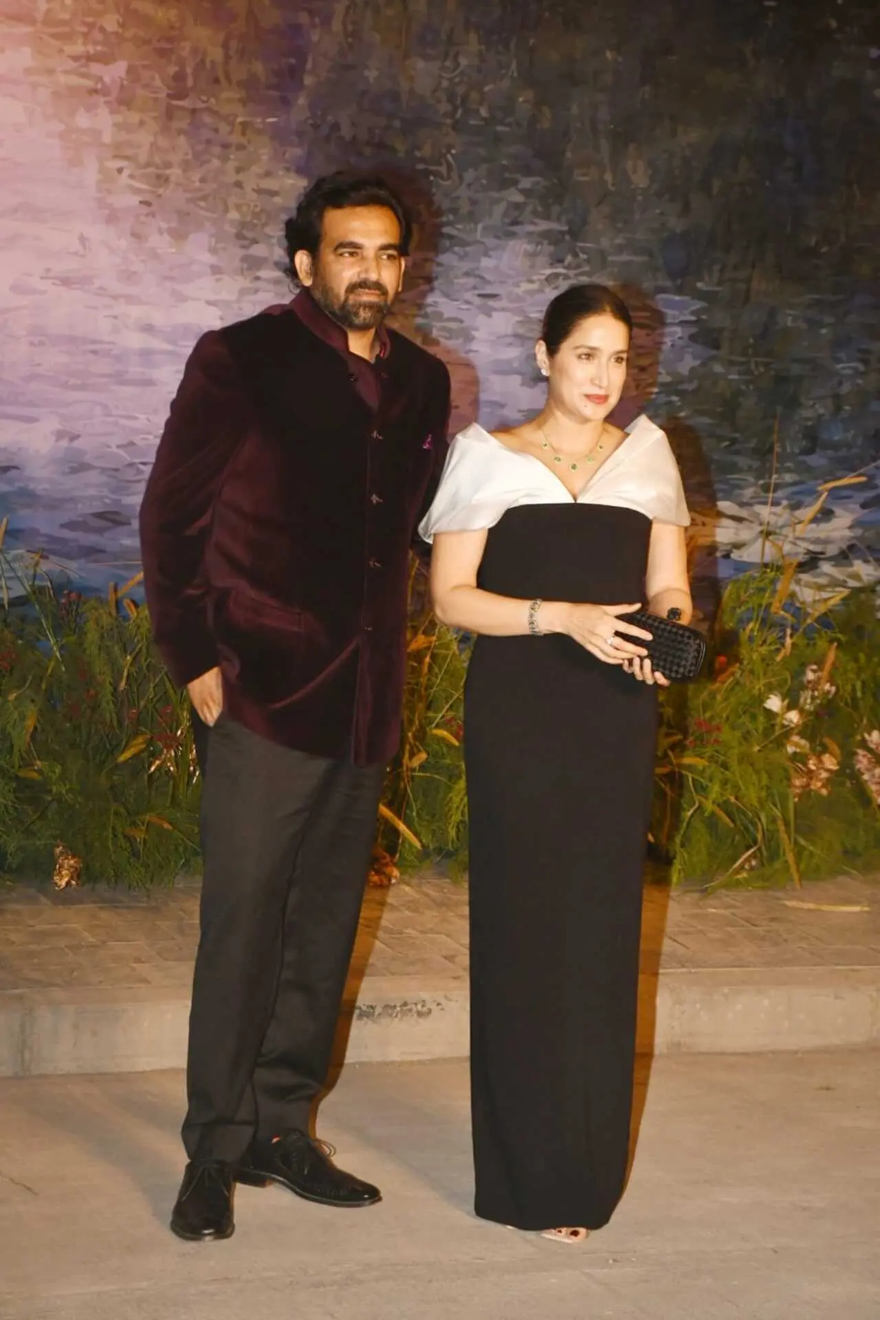Sagarika Ghatge looked stunning in a sleek black gown paired with a dramatic white cape, exuding elegance and contemporary glamour. Zaheer Khan complemented her perfectly, making them a picture-perfect duo on the red carpet.